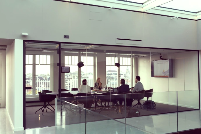 people sitting on chair inside building
